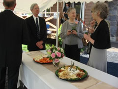Guests engage over appetizers