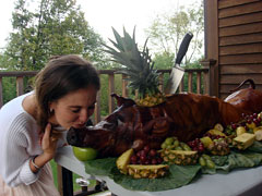 It's become a tradition! Kissing the pig before it is carved is becoming so popular, we're going to have to create a page just for the pictures!