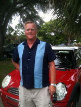 Terence Lernihan with red Mini Cooper